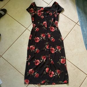 Black rose-printed short-sleeved dress.